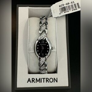 Brand new silver watch with faux diamonds